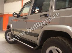 Praguri aluminiu J. G. Cherokke '93-'98 P011 Bullbar inox Jeep Grand Cherokee '93-'98, bullbar poliuretan Jeep Grand Cherokee '93-'98, praguri inox Jeep Grand Cherokee '93-'98, praguri aluminiu Jeep Grand...